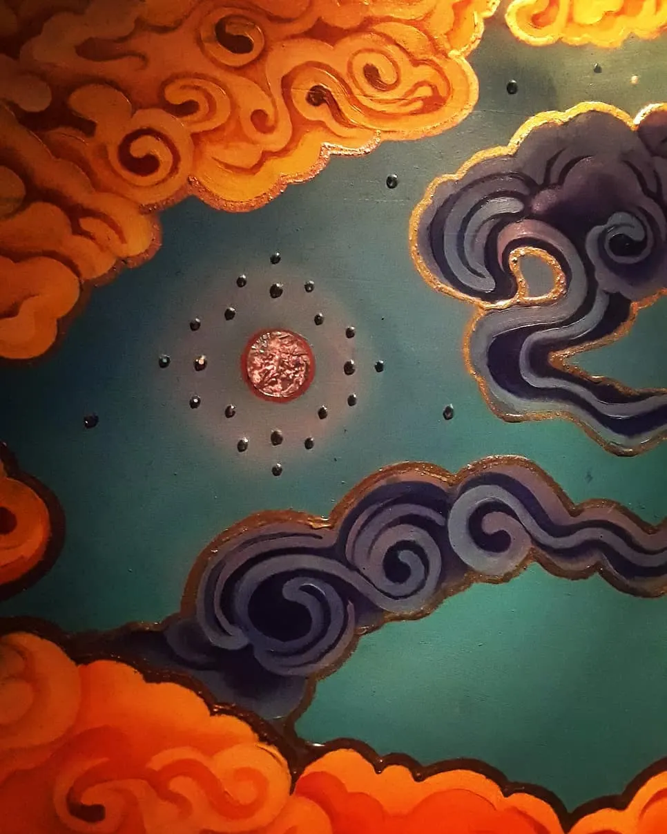 Clouds and a jewelled sun